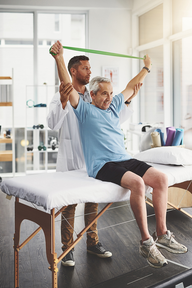 Physiotherapist, resistance band and senior patient stretching f